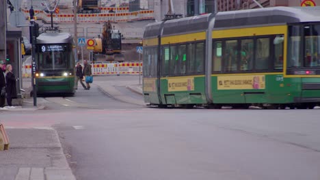 Rail-tracks-carry-public-transit-train-cars-on-clean-Helsinki-street