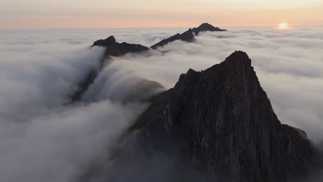 Aerial-view-of-Segla-mountain-above-the-sky,-Norway-during-summer