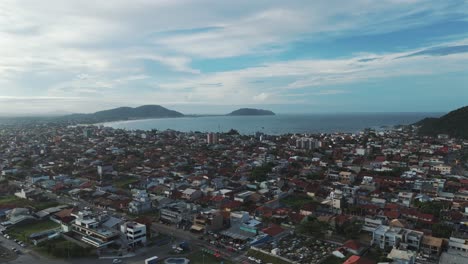 Aerial-view-of-Enseada-Beach-and-its-buildings-in-São-Francisco-do-Sul,-Santa-Catarina,-Brazil