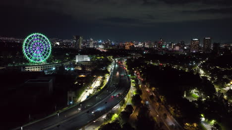 Aerial-view-of-traffic-on-the-Parkway-drive,-night-in-Chapultepec,-Mexico-city
