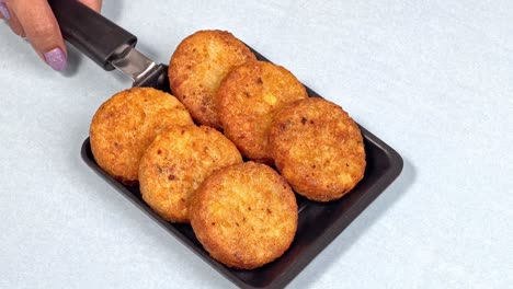 Aloo-tikki-or-Potato-Cutlet-or-Patties-is-a-popular-Indian-street-food-made-with-boiled-potatoes,-spices-and-herbs-in-india