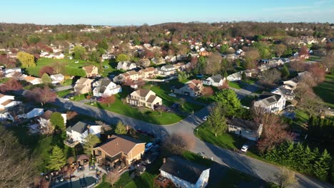 Establishing-drone-shot-of-American-City-suburb-at-sunset-time