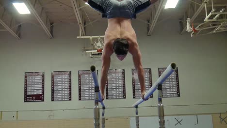 Gymnast-does-a-routine-on-the-Parallel-Bars