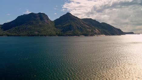 Forward-aerial-view-of-landscape-of-Freycinet-Tasmania,-Australia-during-afternoon