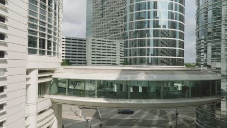 An-aerial-drone-view-of-the-Chevron-Skywalk,-which-connects-the-Chevron-buildings-at-Smith-Street-in-downtown-Houston,-Texas