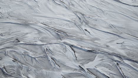 Beautiful-frozen-landscape-of-white,-Icelandic-river-of-tranquility