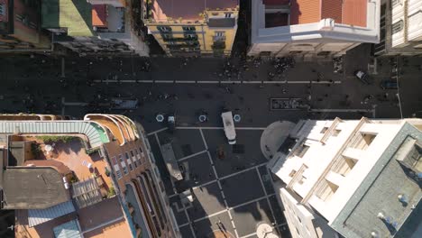 Top-Down-Aerial-View-of-People-Walking-on-Via-Toledo-in-Naples,-Italy