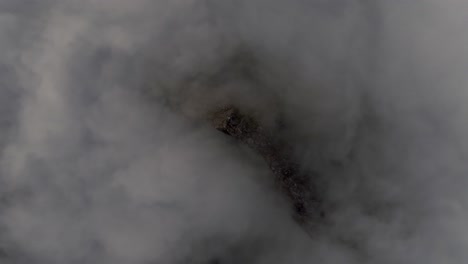 Aerial-view-of-Segla-mountain-above-the-sky,-Norway-during-summer