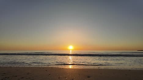 Sunrise-on-the-beach-shore-next-to-the-sea