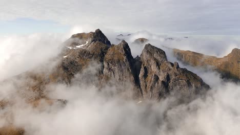 Aerial-view-of-Segla-mountain-above-the-sky,-Norway-during-summer