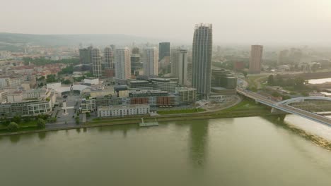 Early-morning-in-Bratislava-Downtown-with-Eurovea-shopping-and-Slovak-national-theatre-on-Danube-river