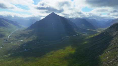 Aerial-View-of-Glen-Coe,-Scenic-Valley-in-Highlands-of-Scotland,-Lush-Green-Hills---Panorama-of-Scotland-from-Above,-Great-Britain,-Europe