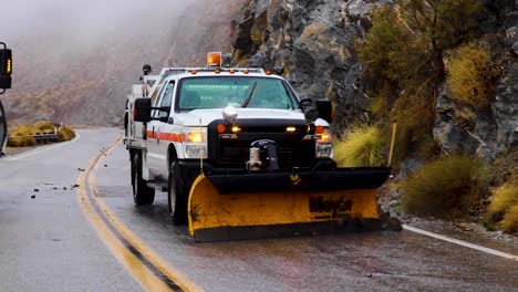 Stone-and-branch-removal-machine:-road-cleaning-vehicle-clearing-debris-after-a-storm-in-the-hills