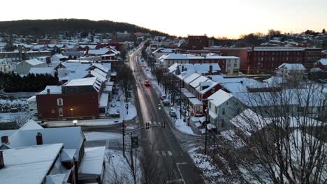 Main-street-of-American-town-during-snow-covered-sunrise