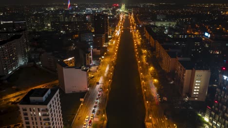 4k-Aerial-Hyperlapse-over-Basarab-Bridge-and-Dambovita-River-in-Regie,-Bucharest,-Romania