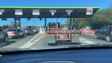 Busy-Toll-Booth-Traffic-on-Sunny-Day-in-Costa-Rica