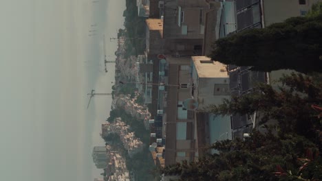 vertical-video,-View-of-Haifa-towards-the-sea,-Haifa-port,-Israel