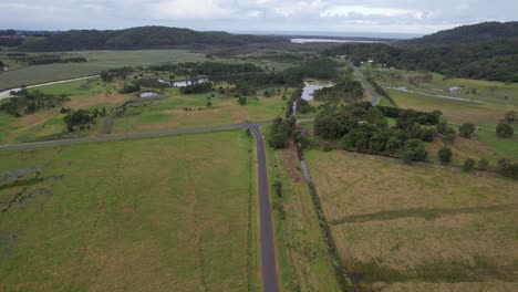 Lush-Fields-Along-Clothiers-Creek-Road-In-Tanglewood,-NSW,-Australia