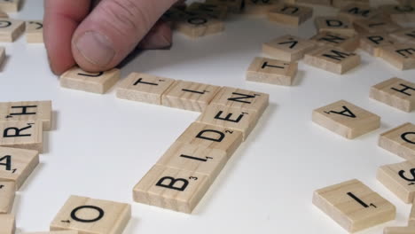 Words-BIDEN-and-PUTIN-are-formed-on-table-top-from-Scrabble-letters