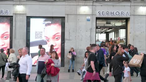 Shoppers-and-pedestrians-are-seen-outside-the-French-multinational-personal-care-and-beauty-retail-brand-Sephora-store