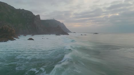 Ocean-wave-breaking-surrounded-by-cliffs