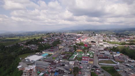 Panoramic-aerial-view-of-the-colorful-city-Filandia,-Quindio,-Colombia,-coffee-region