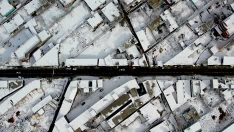 Aerial-top-view-of-crowded-Skardu-city-covered-with-snow-in-Pakistan