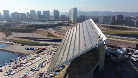 Aerial-shot-of-the-photovoltaic-solar-panels-of-Forum-Park-on-a-sunny-day-in-Barcelona