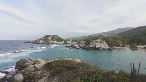 Cabo-San-Juan's-serene-coastline-in-Tayrona-National-Park,-Colombia---panoramic-view