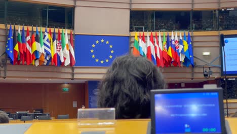 European-Parliament-Chamber-with-EU-and-States-Flags-Display,-Brussels