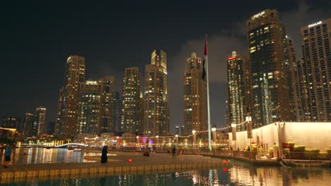 Pan-shot-of-the-Dubai-skyline-with-the-Address-Hotel-near-the-Dubai-Fountain-in-the-United-Arab-Emirates-