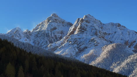 Early-November-morning-first-snow-on-Europe-Australian-Swiss-Alps-peaks-fall-autumn-Stubai-Village-chalet-Tirol-Tyrol-Austria-frosted-sunshine-Innsbruck-mountains-landscape-static-shot