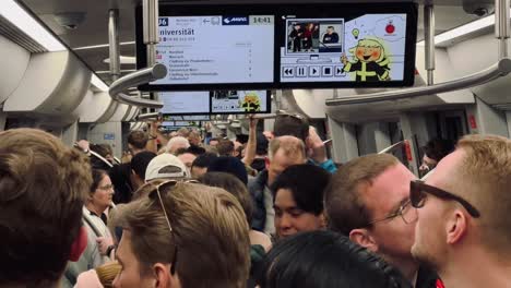 Crowded-Subway-in-German-City-with-modern-screen