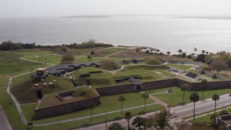 Panning-close-up-aerial-shot-of-historic-Fort-Moultrie-protecting-Charleston-Harbor-on-Sullivan's-Island,-South-Carolina