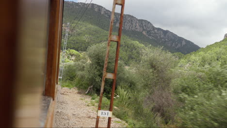 Scenic-view-from-vintage-train-in-Soller,-Mallorca