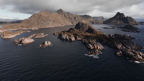 Aerial-view-of-Segla-mountain-above-the-sky,-Norway-during-summer