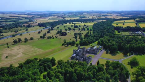 Famous-Scottish-Landmark-Aerial,-Floors-Castle-in-Kelso-situated-in-the-Scottish-Borders,-Scotland,-United-Kingdom