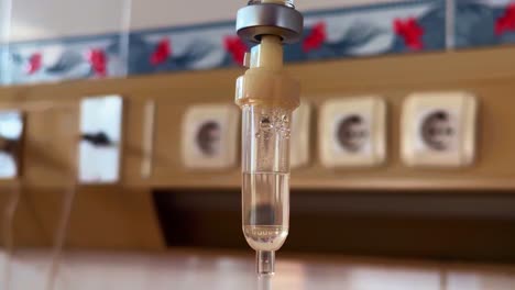 The-drop-counter-of-a-medical-infusion-in-close-up