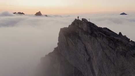 Aerial-view-of-Segla-mountain-above-the-sky,-Norway-during-summer