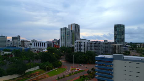 Aerial-Drone-of-Darwin-City-CBD-Australia-NT-with-Golden-Hour-Yellow-Glow-in-Cloudy-Sky