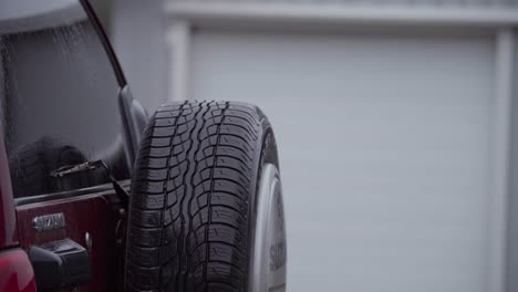 Spare-Tire-Mounted-On-The-Back-Of-Suzuki-Car