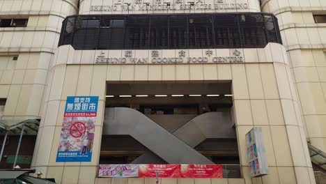 Tilt-up-shot-of-tall-Sheung-Wan-cooked-food-centre-building-in-Western-market-of-Hong-Kong