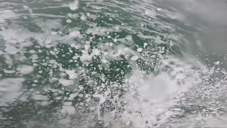 First-Person-View-of-Surfer-in-the-Ocean-near-the-Beach-in-Cascais,-Portugal