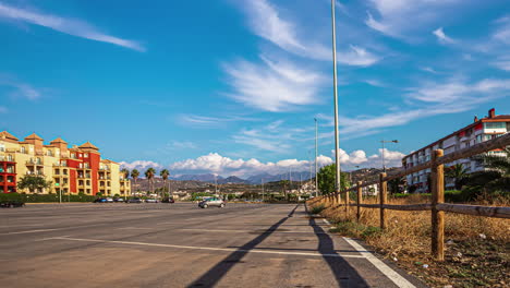 Side-view-of-Malaga,-warm-midday-near-colorful-resort,-architectural-wide-angle