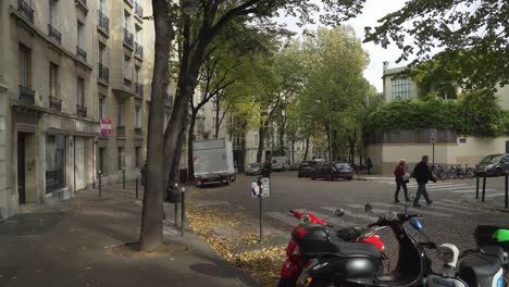 Parisians-Cross-Passage-in-the-Parisian-Cobble-Street-of-Montmartre