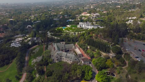Drone-Flying-Over-Historic-Greystone-Mansion-and-Upscale-Compounds-in-Beverly-Hills,-California