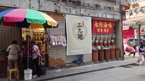 Profile-view-of-roadside-old-sea-food-store-in-Kennedy-Town,-Hong-Kong