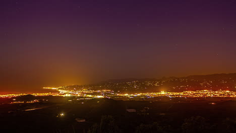 Transition-timelapse-from-midnight-until-dawn,-murky-morning-in-Malaga