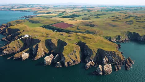 Above-the-Cliffs-and-Natural-Scottish-Wonders-of-St-Abbs-Head-Cliffs,-Views-of-Scotland's-Rugged-Shore,-United-Kingdom