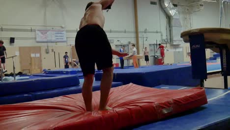 Gymnast-performs-a-flip-on-the-vault